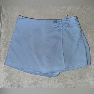 Light Blue Mini Skort with Bow Detail and Side Zip Closure